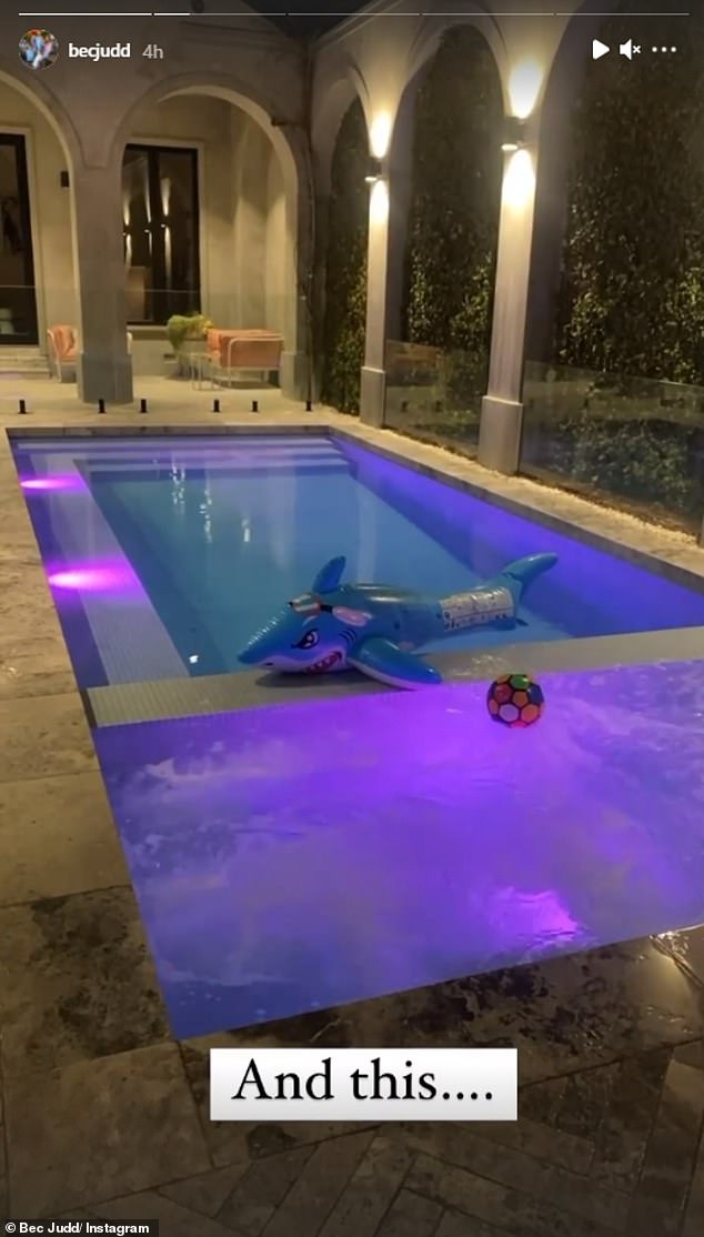 Lockdown isn’t so bad in Brighton! Rebecca Judd shows off her VERY cool illuminated heated pool at her $7.3million mansion in Melbourne