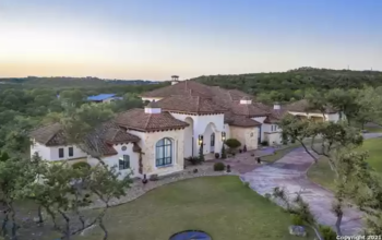 This San Antonio mansion for sale has both marble countertops and marble kitchen cabinets