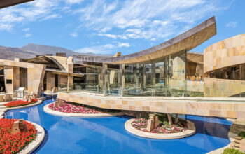 This $49.5 Million Palm Springs Mansion Has Three Pools and an Aquarium Tunnel