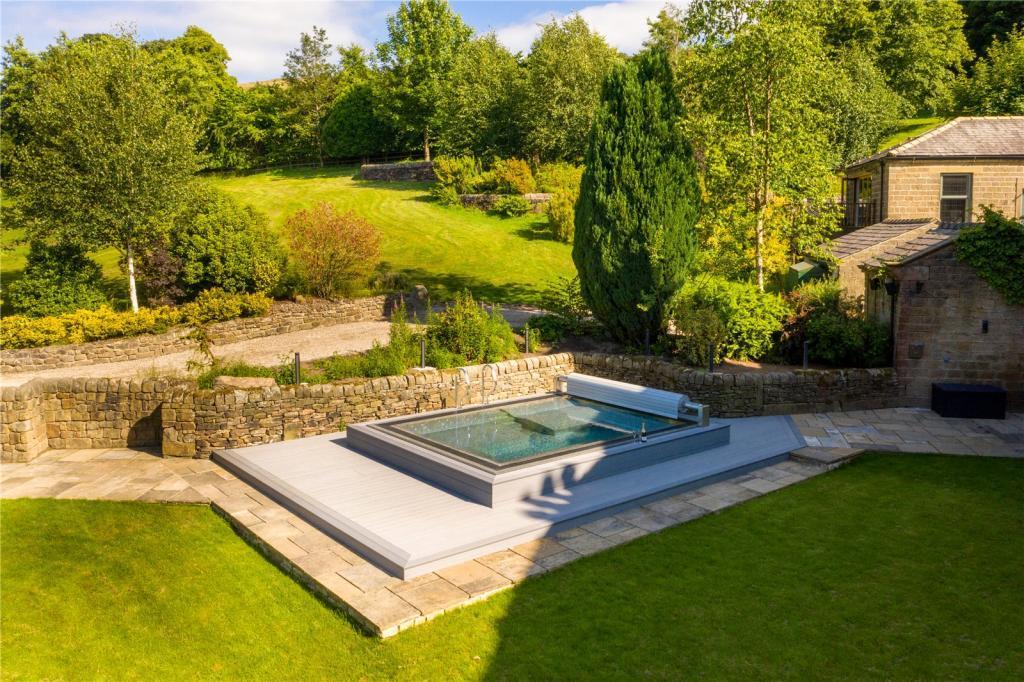 This Pendle £2.95m mansion has helipad, cinema, bar, paddock, jacuzzi and great views of the countryside